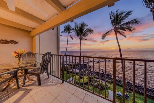 Sip A Drink As The Sun Sets Over The Ocean