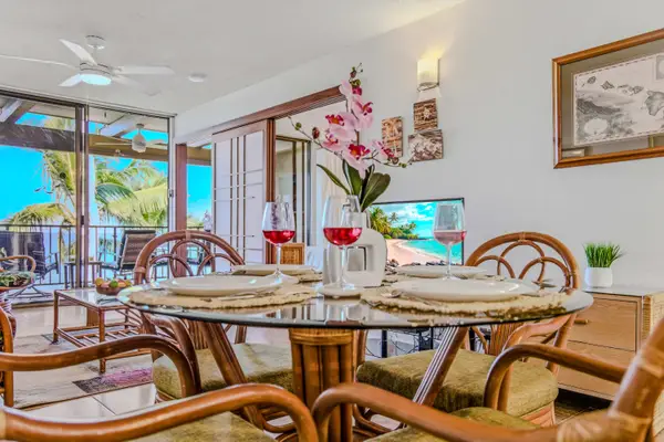 Beautifully arranged dining table and chairs in a bright, open-concept living space. 🍽️