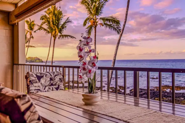 Scenic oceanfront balcony view during a beautiful tropical sunset. 🌅🌴