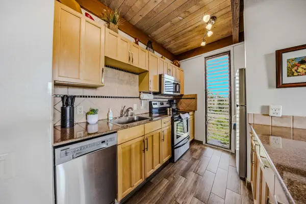 Sleek Stainless Appliances And Premium Granite Countertops