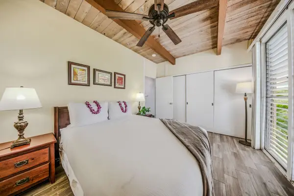 Plush Bedding And Island Decor Designed For Deep Rest