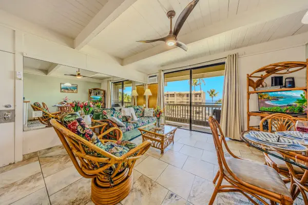 Unwind In Style Within This High Ceiling Tropical Retreat