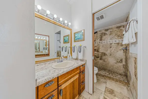 Bright Modern Bathroom Featuring A Custom Tile Walk In Shower