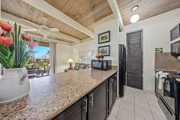 Modern Kitchen Peninsula Ready For Your Morning Coffee And Conversation