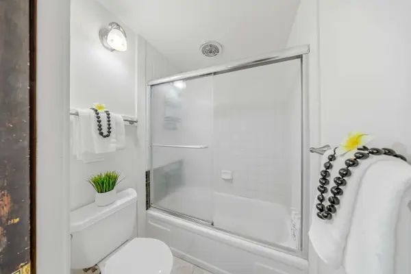 Refresh And Renew In The Sparkling Clean Glass Enclosed Shower