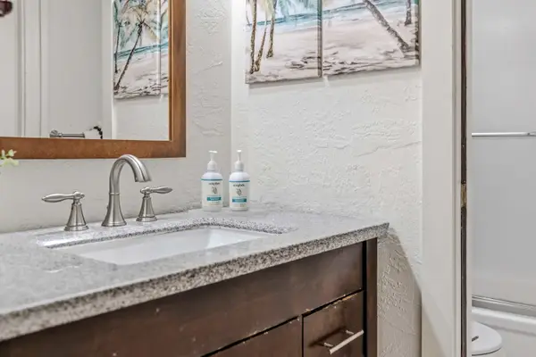 Clean Modern Vanity Setup Stocked With Premium Amenities