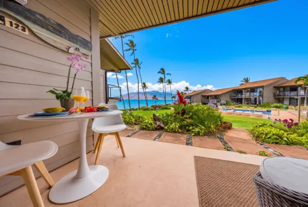 Enjoy outdoor dining on the private ground-floor lanai