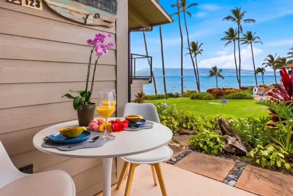 Morning coffee with tropical garden and ocean views