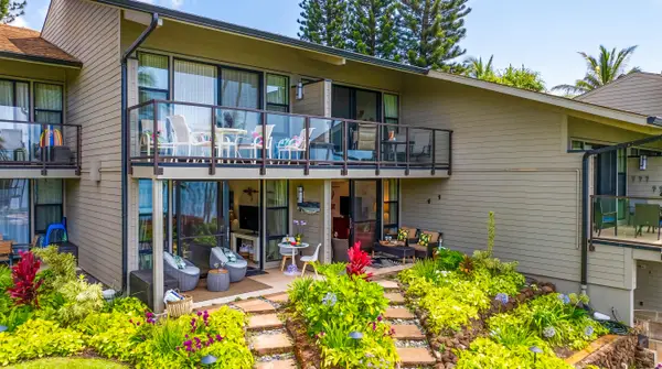 Well-maintained property nestled in tropical gardens