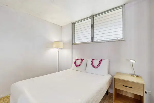 Recharge in the cozy comfort of Bedroom 2, complete with a practical double bed.
