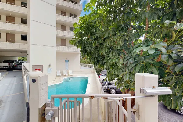 Relax beside the water or enjoy a refreshing swim in this shared pool area.