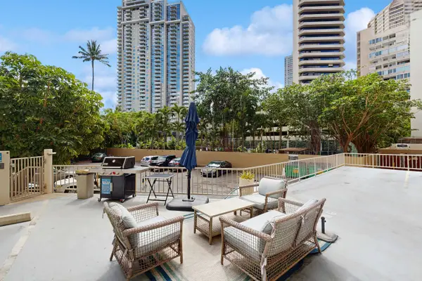 Spend leisurely moments relaxing beside the pool in the comfortable seating area.