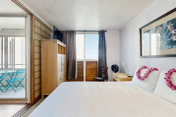 Enjoy peaceful nights in Bedroom 1 with the added comfort of a queen-size bed.