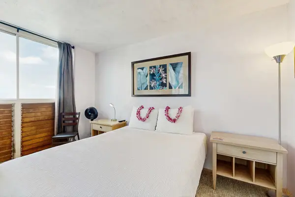 Make yourself at home in Bedroom 1, offering a cozy queen bed for a restful retreat.