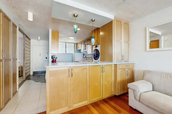 Relax and prepare meals with ease in the comfortable living room and kitchen area.