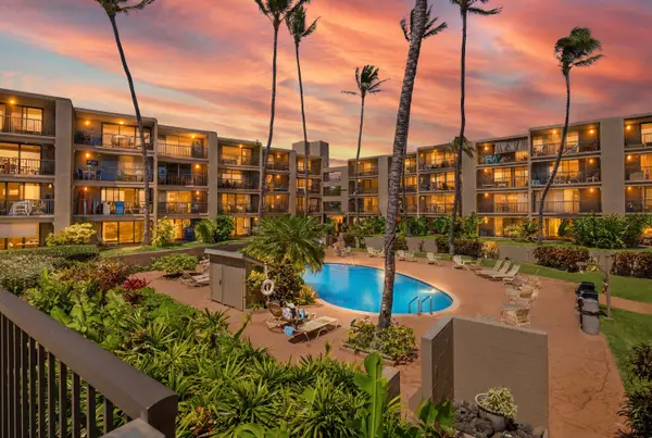 Twilight Bliss By The Resort Pool Among Swaying Palms