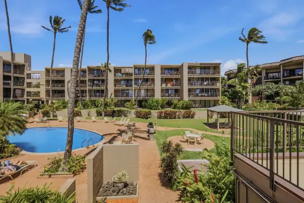 Glistening Pool And Shaded Lounge Areas