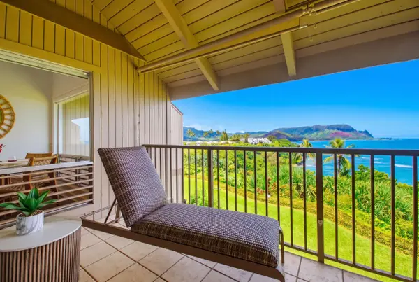Covered lanai with chaise lounge and ocean breeze