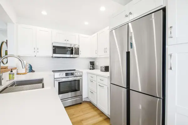 Bright kitchen with stainless steel appliances