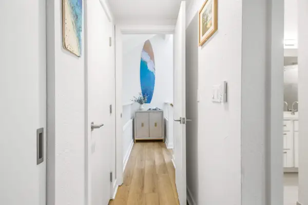 Hallway connecting the home's living spaces
