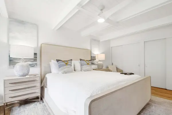 Bright secondary bedroom with cozy ambiance