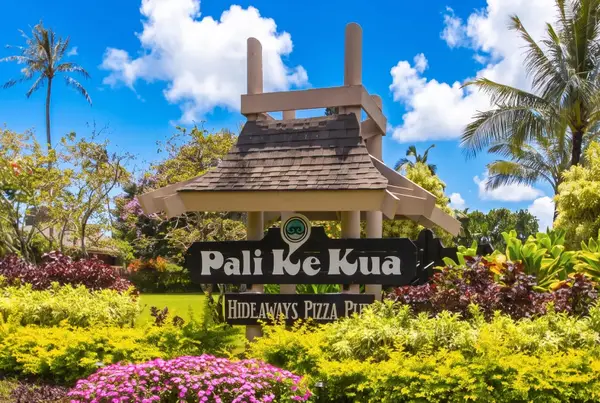 Property entrance sign welcoming guests