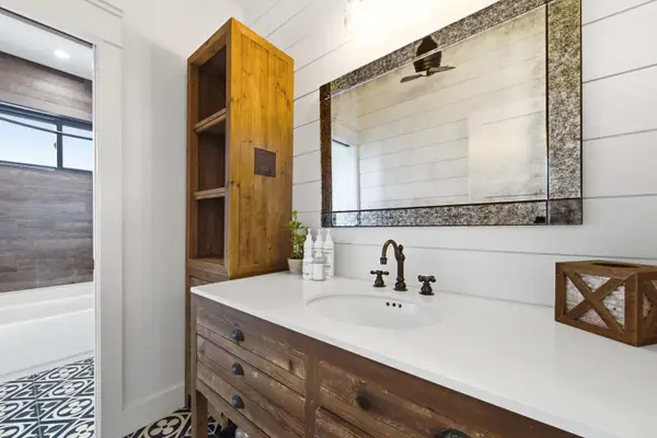 Spacious bathroom vanity with large mirror