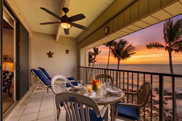 Covered Oceanfront Balcony Dining Area with Stunning Sunset Views