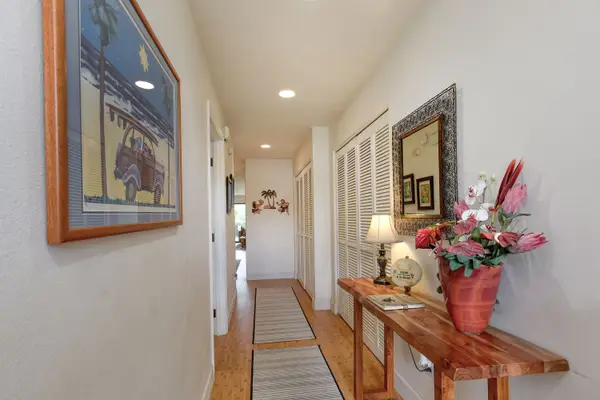 Bright Hallway Leading To Bedrooms