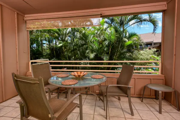Private Lanai Dining Surrounded By Tropical Greenery