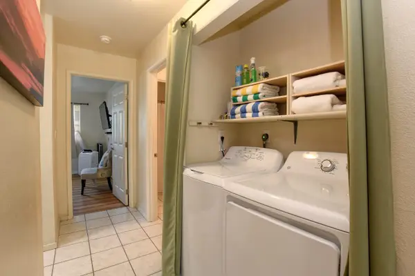 Spacious Bathroom With Laundry Convenience