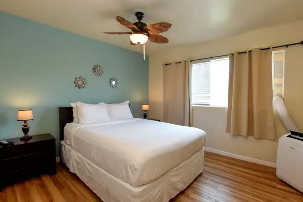 Peaceful Bedroom With A Soft Tropical Touch