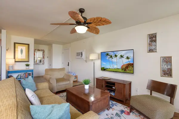 Inviting Open Living Area With Tropical Charm