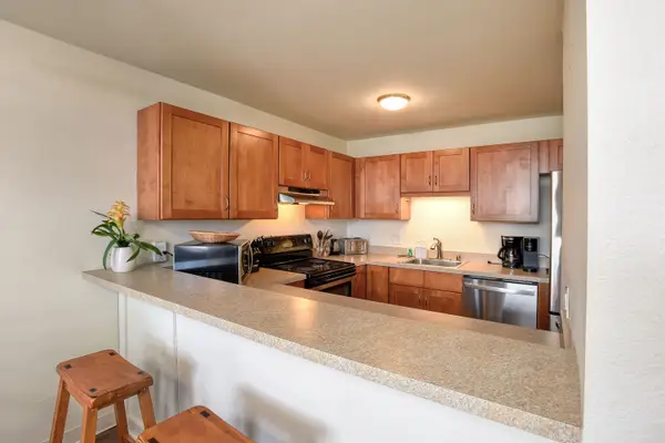 Spacious Kitchen With Convenient Breakfast Bar