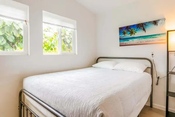 Studio with queen bed and flat screen tv.