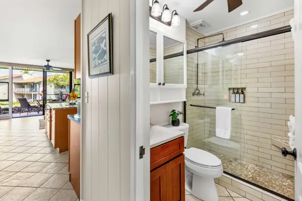 Hallway w/ bathroom entry view