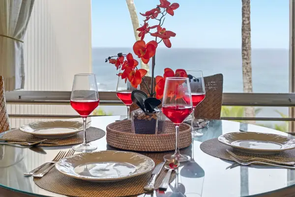 Dining room features coordinated seating around a welcoming wooden table