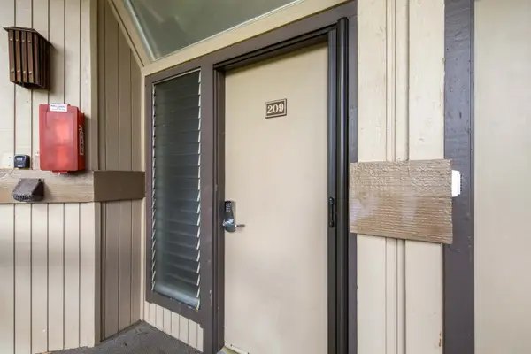 Welcoming entryway features covered access and exterior details