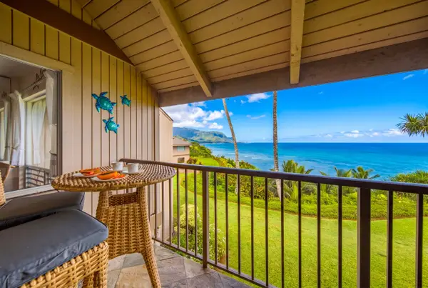 Scenic lanai combines comfort, colorful landscaping, and expansive ocean views