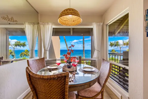 Dining room features coordinated seating around a welcoming table