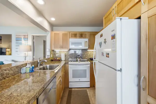 Inviting kitchen area makes everyday cooking comfortable and convenient for guests