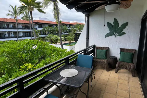 Enjoy air balcony dining with scenic greenery and coastal surroundings
