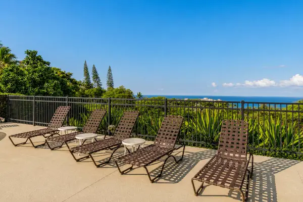 ​Sit back, relax, and soak up the sun on comfortable lounge chairs with a view