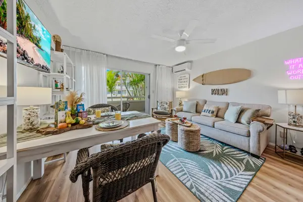 Open-Concept Living & Dining Area with Coastal Décor