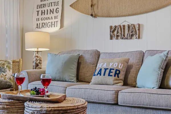 Comfortable sofa with wine tray & coastal decor