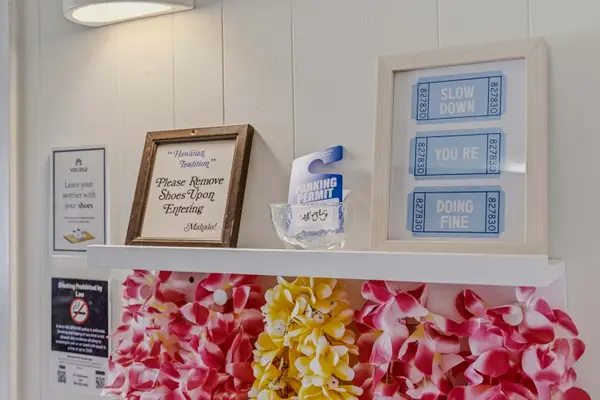 Framed guest instructions & wall decor display.