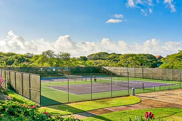 Championship Tennis Under Blue Skies