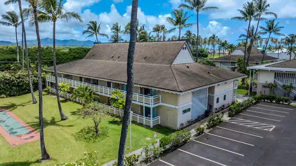 Aerial view of resort building and parking area