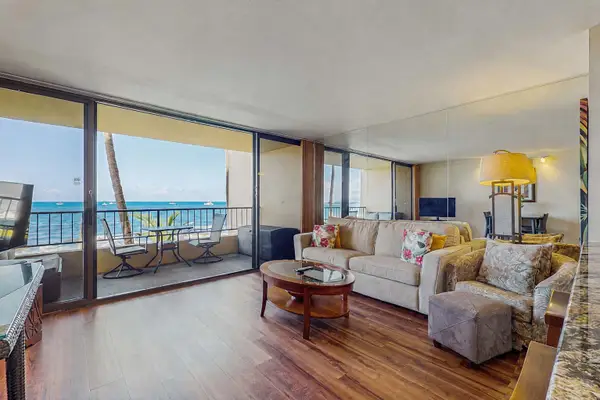 Living room with lots of natural light from the lanai.