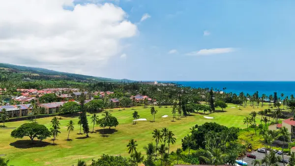 Elevated view of lush golf course green and surrounding resort grounds